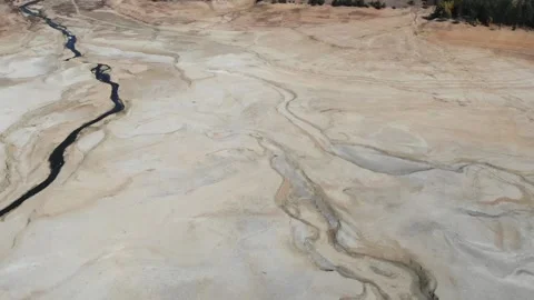 Aerial of specific textures in the ground because of a dry lake. Stock Footage 157673665