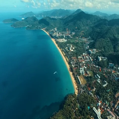 Aerial: Speed boat races on the sea on Karon beach. Stock Footage