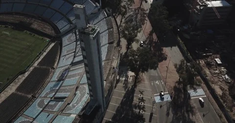 Aerial spirals down around the tower of Estadio Centenario in Monvtevideo Stock-Footage 92184207