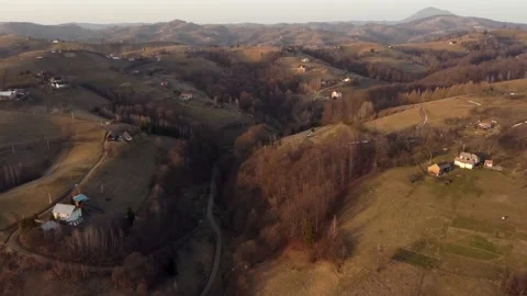 Aerial springtime view above the mountain valley, at Rucar-Bran pass, Moieciu -  Stock Footage 151253835