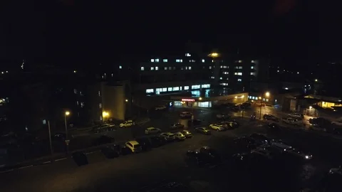 Aerial static hospital night establishing Stock Footage