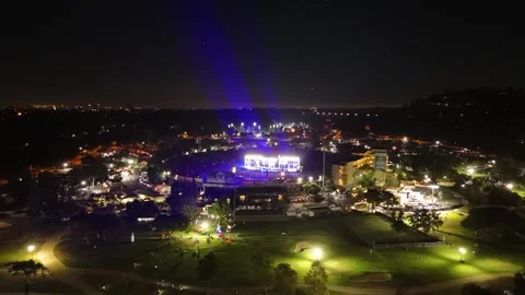 Aerial Static Night Shot of Oasis Concert Light Beams at Rose Bowl Stadium Stock Footage 341898560