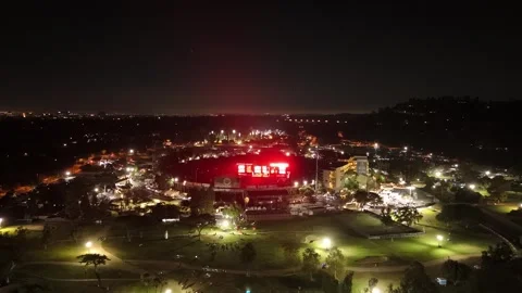 Aerial Static Night View of Red Lit Rose Bowl Stadium During Oasis Show Stock Footage 341898660