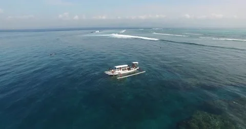 AERIAL static shot of boat near coral reef in Bali Indonesia Stock Footage 59885887