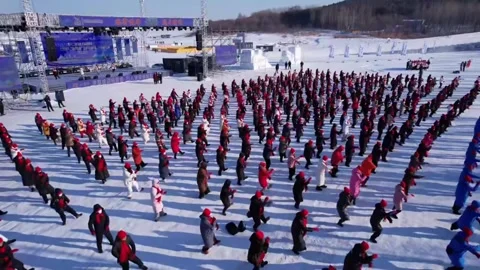 Aerial static shot of a group of elderly women practicing square dance in Ji Video stock 328645284