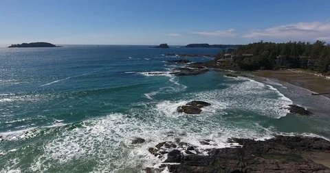 Aerial Static Shot of waves breaking on Pacific Northwest beach Stock Footage 106849067