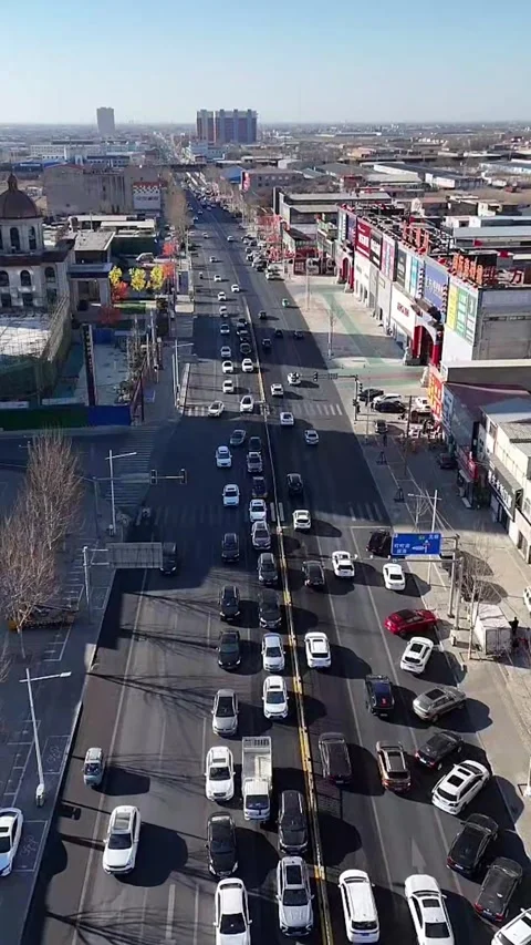Aerial Static View of Busy City Traffic and Modern Architecture Video stock 330099643