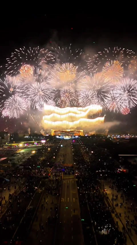 Aerial Static View of Crowds and Spectacular Fireworks During Chinese New Ye Stock Footage 329258645