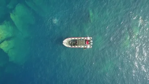 AERIAL STATIC VIEW OF A DIVING BOAT IN CORSICA Video stock 81234912