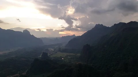 Aerial Static View of Dusk Clouds Over Dark Karst Valley, Pha Ngern Laos Stock-Footage 347419127