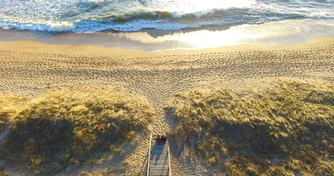 Aerial static view from a top to a couple sitting on the steps - 003 Stock Footage 128577009
