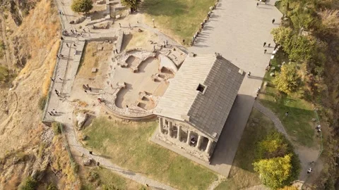 Aerial static view visitors by The Garni Temple - classical colonnaded stru.. Stock Footage 292894967