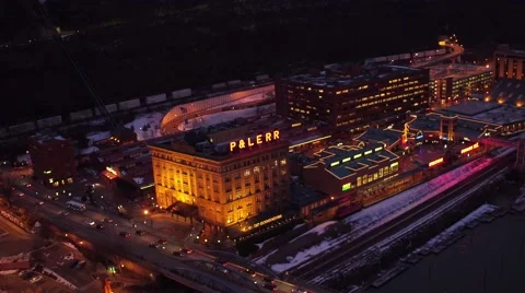 Aerial of Station Square in Pittsburgh at night from the Mon River Stock Footage 59378965