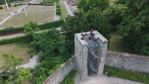 Aerial of a stone viewing tower with spiral staircase at Blankenburg Video stock 337979127