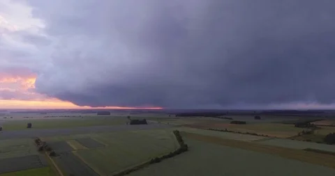 Aerial storm clouds moving fast across the sky Stock Footage 127558353