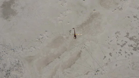 Aerial straight down view of a helicopter taking tourists for a scenic flight Stock Footage 107227555