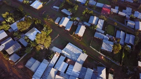 Aerial straight down view of tin roof houses and streets in Ethiopia. Stock Footage 107326293
