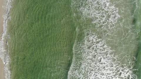 Aerial Straight Down View of Waves Hitting the Beach Stock Footage 103103304