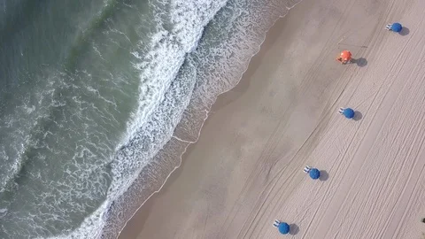 Aerial straight down view of waves crashing along the Atlantic coast Stock Footage 115991110