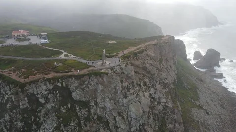 Aerial straight flight over Cabo da Roca cross monument, Portugal, 4K 60fps. Stock Footage 333361452