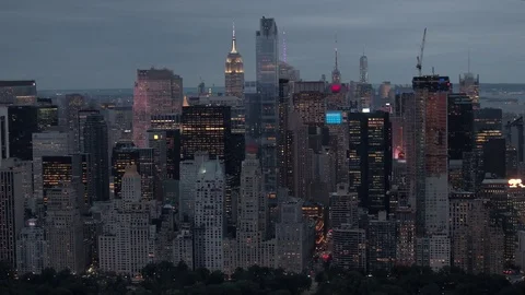 AERIAL Stunning New York City skyline city lights with the Central park by night Stock Footage