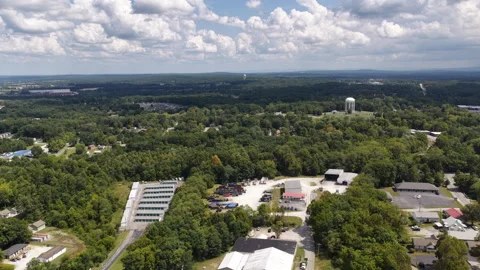 Aerial of suburban development and forest in Crossville Tennessee in summer Video stock 344232584