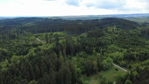 Aerial summer landscape with forests, fields and rolling countryside Stock Footage 336575771