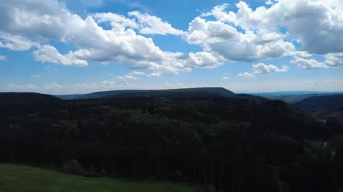 Aerial summer landscape with forests, fields and rolling countryside Stock Footage 336575828