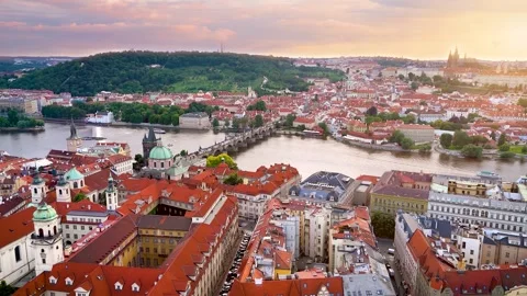 Aerial summer sunset view over the rooftops of the old town of Prague Stock Footage 278029615