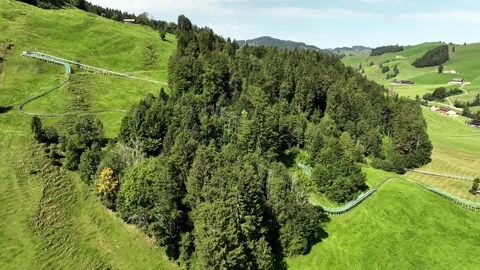 Aerial summer view of the Kronberg with cable car and panoramic alpine land.. Video stock 323696564