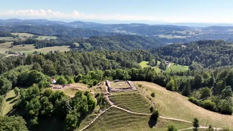 Aerial summer view of the Schauenberg tower with surrounding forest and hills Stock Footage 323698486