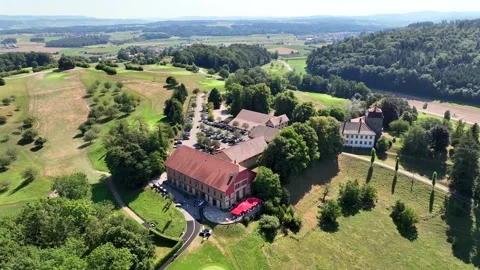 Aerial summer view of Schloss Goldenberg with wide panoramic landscape Stock Footage 323698491