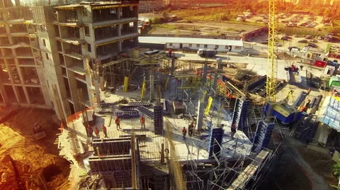 Aerial sun day fly over under construction new modern building work builders and Stock Footage 48481941