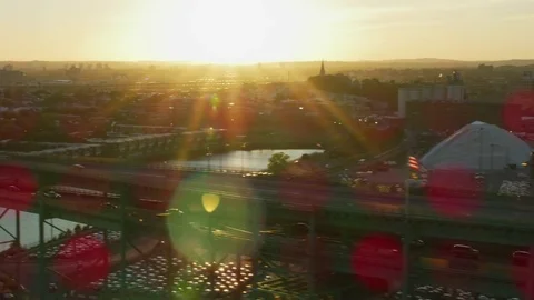 Aerial sun flare view Tobin Memorial bridge Boston Stock Footage 83874484