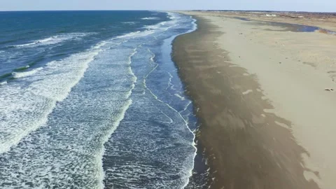 Aerial sun setting over sea ocean, tropical seascape coastline from above. Stock Footage 174097939