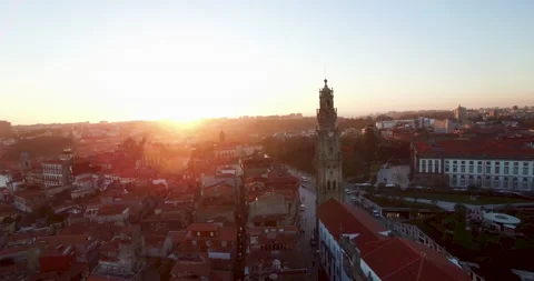 Aerial of sun setting slowly behind typical historic city centre of Porto Stock Footage 155249828