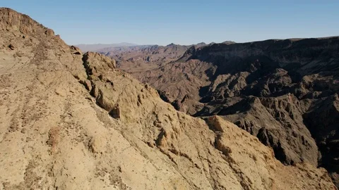 Aerial sunlight view of Mountain Range Mojave desert a remote Extreme Terrain Stock Footage 76851480