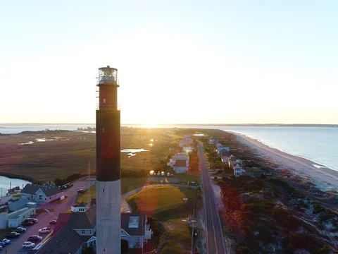 Aerial of a sunrise at the lighthouse Stock Footage 73686068
