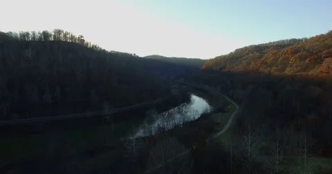 Aerial Sunrise over Mountain River Valley Stock Footage