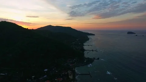 Aerial Sunrise reveal behind Bali Mountain Stock Footage