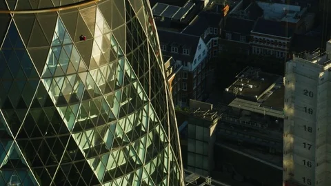 Aerial sunrise view The Gherkin glass exterior London Stock Footage