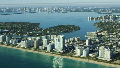 Aerial sunrise view of Miami city Skyline North Beach Condominium Waterfront Stock Footage