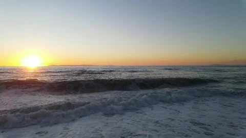 Aerial of Sunset at the Beach Stock Footage 260966219