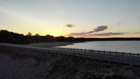 Aerial Of Sunset Behind Dam Stock Footage 141175682