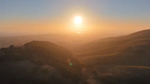 Aerial Sunset Between Hill Silhouettes Over Napa Valley, 4K Stock Footage 337985863