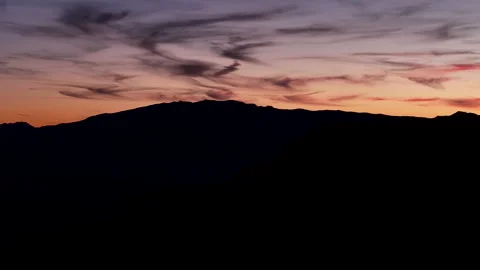 Aerial sunset clouds mountain George Utah dark night 4K Video stock 291614335