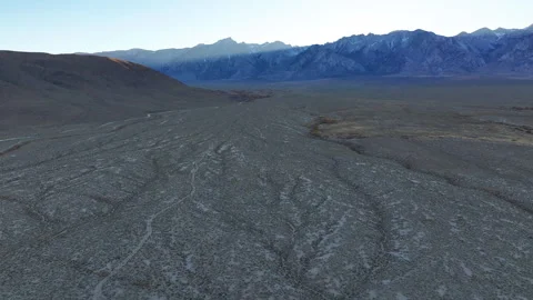 Aerial Sunset in Desert Terrain Rugged Mountainscape