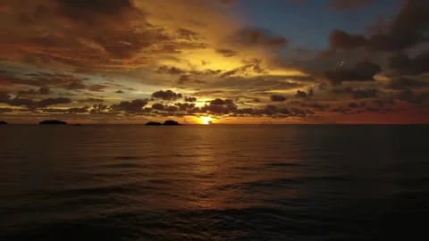 Aerial sunset drone view over tropical ocean horizon Stock Footage 345552789