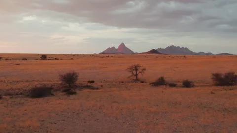 Aerial Sunset Drone View of Spitzkoppe Namib Desert, Damaraland, Namibia Africa Stock Footage 246916346