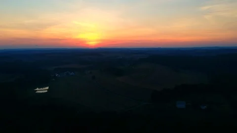 Aerial sunset on farm Video stock 94918878